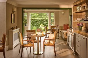 Alexandra Grange, dining area looking out onto garden 