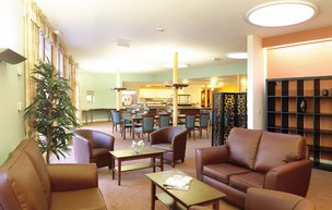 Leadon Bank - Modern comfortable lounge area with leather armchairs