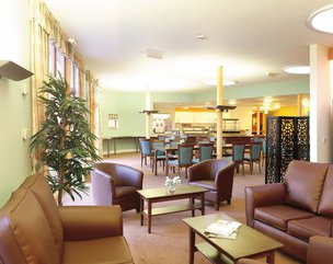 Leadon Bank - Modern comfortable lounge area with leather armchairs