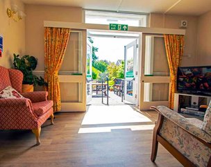 Prestemede Care Home - lounge area with direct access to garden