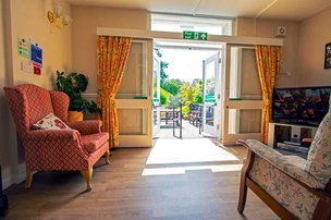 Prestemede Care Home - lounge area with direct access to garden