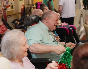 The Belleview ABI Unit - residents taking part in dancing activity