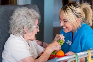 Resident and carer in Monkbarns Care home in Arbroath