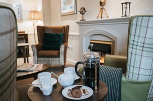 Antonine House Care Home, fireplace and hot drinks