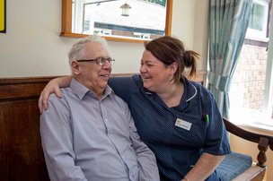 Cartref Dyfi Care Home - Resident with Carer