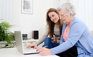 The Bespoke Life companion helping client with computer