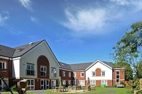 Charles Court Care Home, Hereford, exterior of home with garden