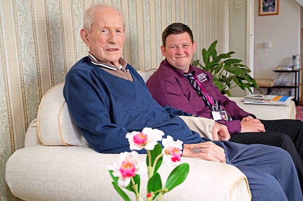 CareYourWay Bury & Rochdale, carer sitting down with eldery man 