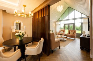 Garden Lodges, lounge area with dining table 