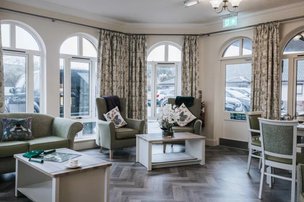 St Modans Care Home, living space with large windows 