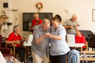 Oaklands Court Nursing Home in Horam gentleman dancing with carer