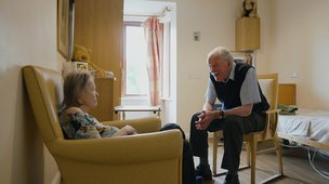 The Hawthorns Nursing Home - resident in bedroom with visitor