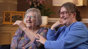 Plas Cae Crwn Care Home - resident and family member laughing