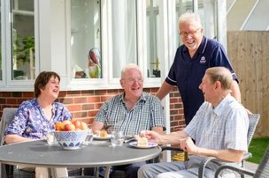 Radfield Home Care Watford & Borehamwood Live in carer sitting with clients outside