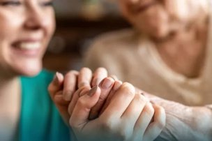 Walfinch Reigate & Horsham, holding hands 