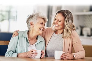 Visiting Angels Stirlingshire carer having a laugh with client