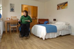 Linford Grange, Newport, bedroom with eldery lady 