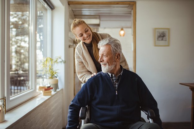 Cindy Care in Milton Keynes, carer pushing client in wheelchair