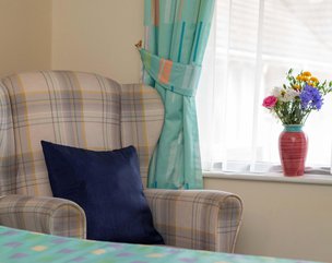 Ashfield House, Wellingborough - Armchair in Bedroom