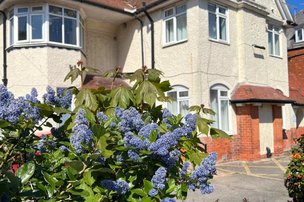 Bridlington Manor, flowers outside the building. 