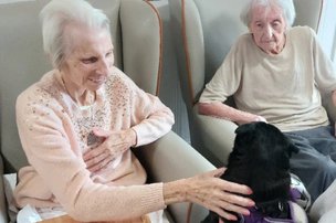 Brook House, resident with dogs 