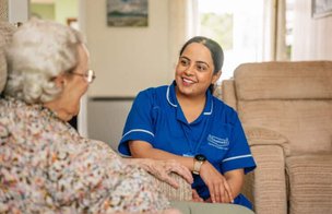 Caremark North Norfolk and Great Yarmouth, carer with elderly woman at home