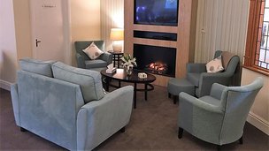 Clarendon Hall Care Home in Grimsby, lounge with fireplace
