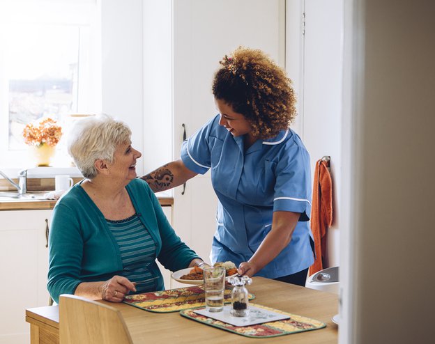 Care Matters Middlesbrough carer serving meal