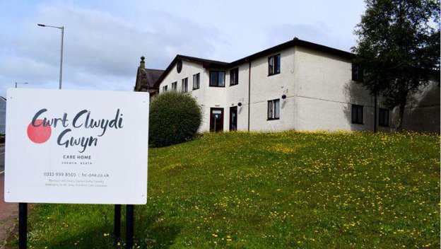 Cwrt-Clwydi-Gwyn, exterior of home with sign 