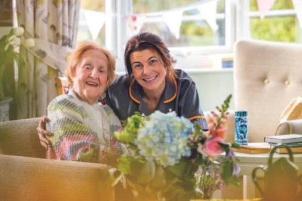 Dingle Meadow, carer with resident 