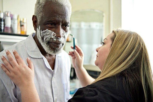 Perfect Quality Care in Croydon carer helping with shaving