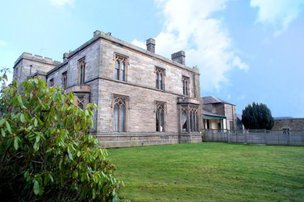 Aaron House Nursing Home in Penicuik exterior of the home with garden