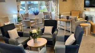 Eastbank, lounge area with blue chairs 