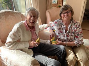 Walfinch Oxfordshire, client laughing with carer