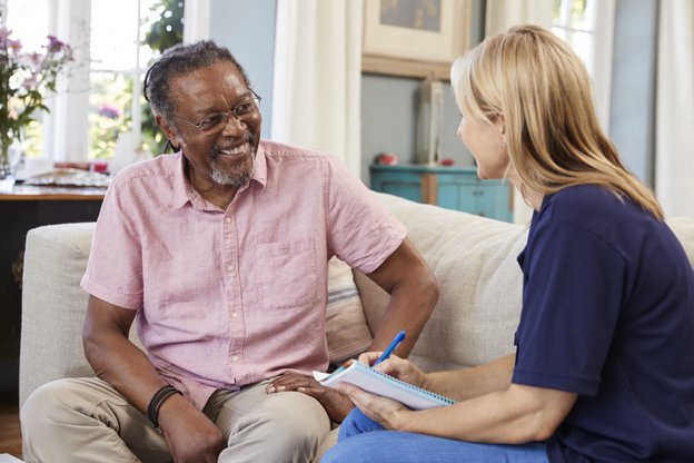 Rise and Shine Services live in, in Leeds, carer sitting with man