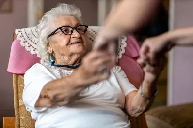 1st Focus Homecare, holding hands with lady 