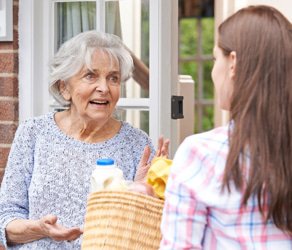 Keyznow Health and Social Care in London, carer helping at door