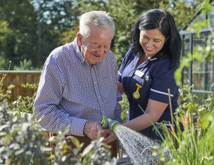 Lea Grange. Resident gardening 