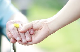 GoodOaks Homecare - Farnham, Alton, Haslemere, holding hands 