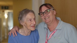 The Hawthorns Nursing Home - resident and carer smiling together