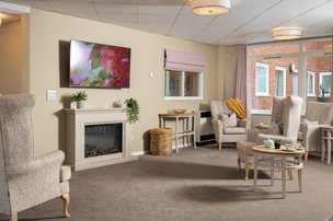 Heffle Court, Heathfield, living area with fireplace 