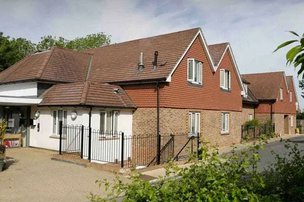 Highfield House, exterior with gated area. 