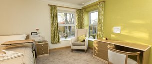 The Chadwick Care Home in Hoddesdon, bedroom with green walls