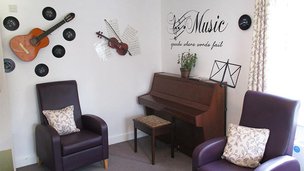Holmwood Nursing Home in Norton Lees Sheffield,  lounge with musical instruments