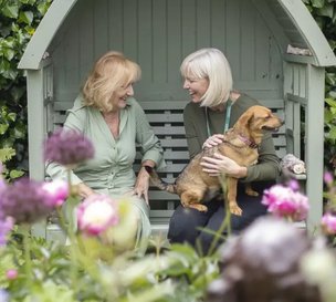 GoodOaks Home, Carer with client in the garden