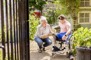 Blue Arch Home Care in Leicester, Leicestershire care giver with man who has physical disability