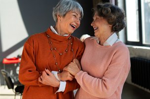 Flourish Advanced live in Care in Bedfordshire and Hertfordshire, carer and lady laughing together