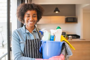 Flourish Advanced live in Care in Bedfordshire and Hertfordshire carer with cleaning bucket