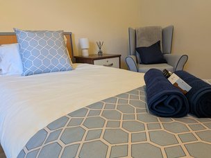 Queensway House, Hemel Hempstead, bedroom with blue and white bedding