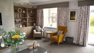 Leighton Court, lounge area with yellow chair 